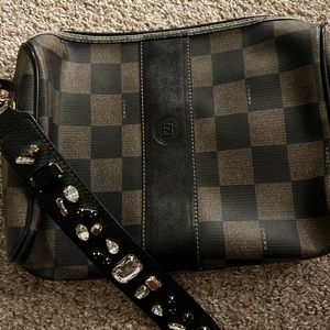 Fendi vintage purse- strap was added to bag. Strap is not Fendi.